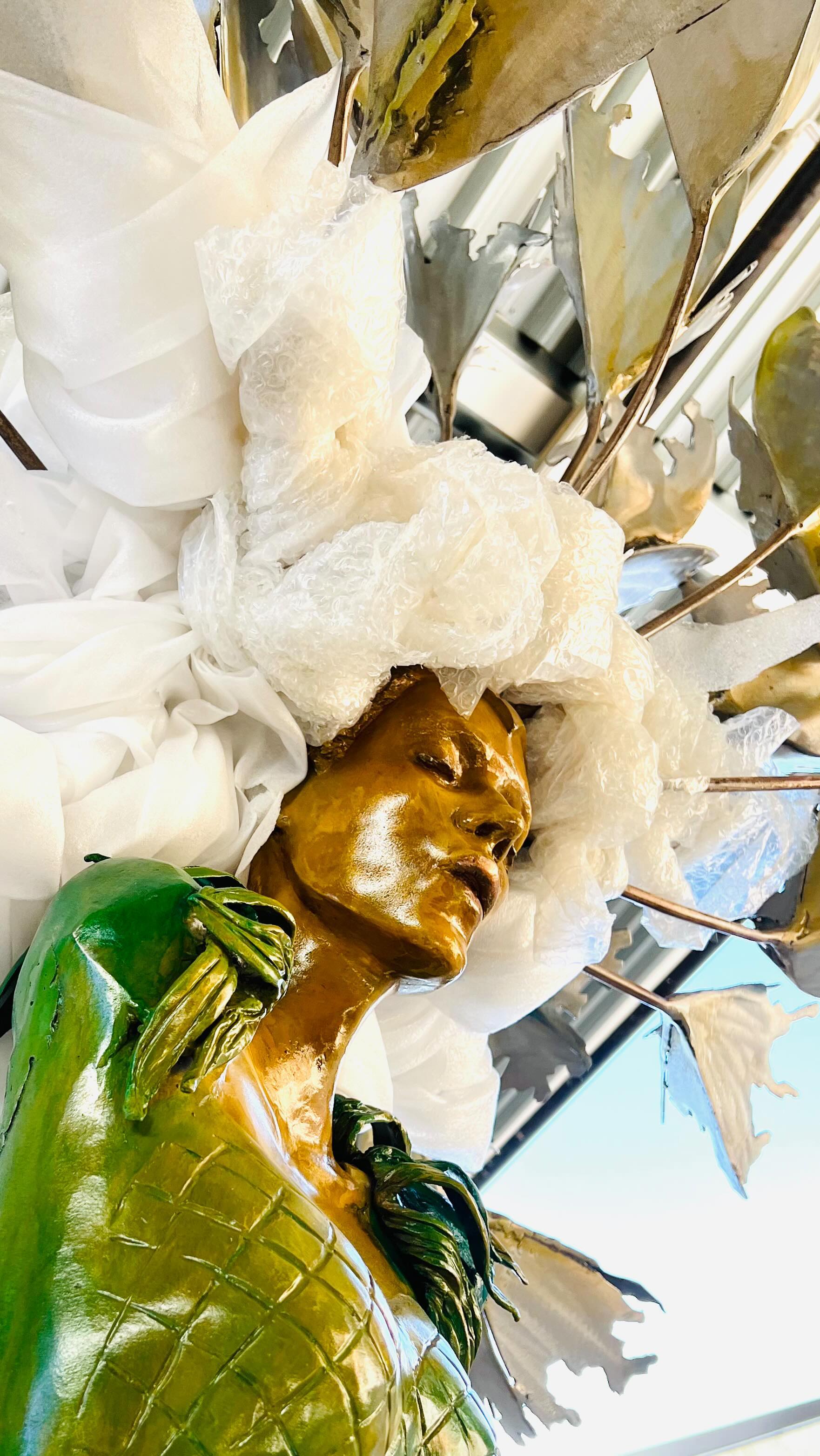 She’s on the move!
Tomorrow “Seeds of Growth” will be installed at DeSoto, KS City Hall. She got her hair all put up in foam for the occasion! And she got a body wrap.
It was quite the process getting her in the crate—thanks to all the fantastic support of my friends at @jcccfinearts! Matt saved the day tonight helping me get her all secured.
And @britni.jarv rescued Ella from soccer practice when we weren’t quite done building the crate.
Sculpture is a team sport! So grateful to awesome teammates.
Praying she shows up after the trip in the truck still looking her best!
#aluminumsculpture #movingsculpture #bubblewrap #publicartinstallation