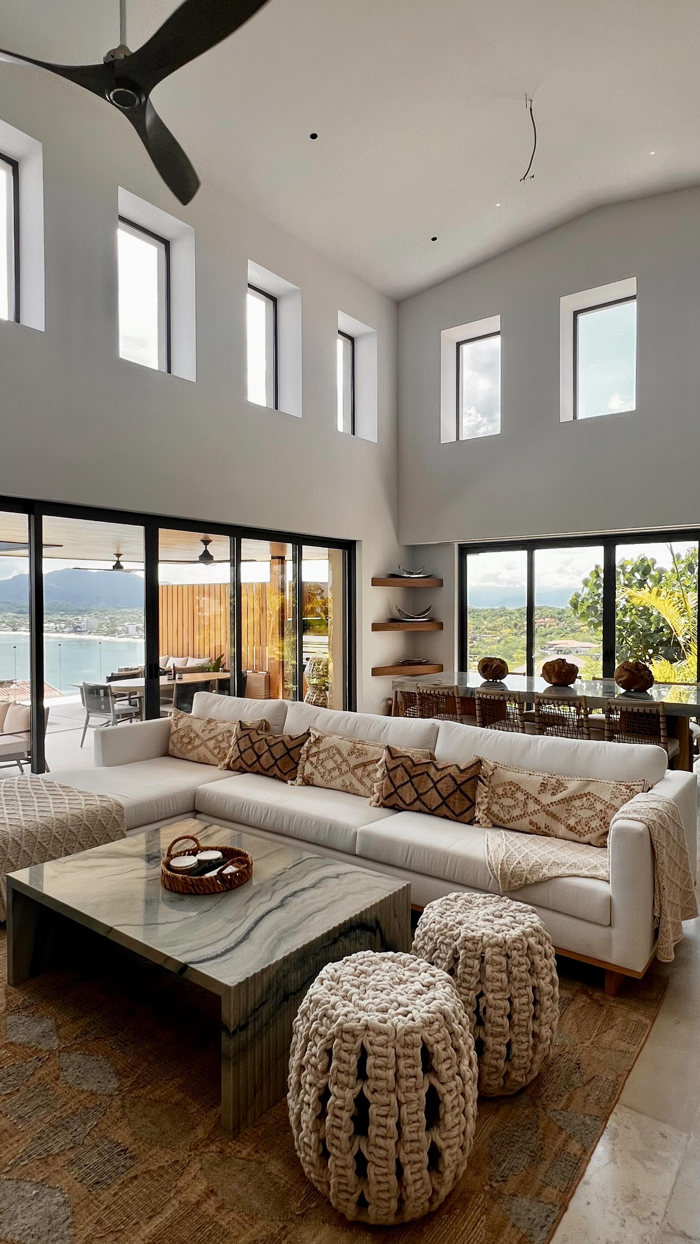 Welcome to Casa Mar y Cielo - the design masterpiece we completed last year!
This beautiful new home sits on the coastal edge of Punta Mita, Mexico and encapsulates the perfect harmony between nature, modern design, and timeless luxury. See our previous reel to see where we started!
With an emphasis of natural textures and the use of organic materials throughout, the space creates a serene and airy ambiance that is both beautiful and sustainable for our clients.
Of course, the home’s design centers around the breathtaking views from nearly every room, and the seamless indoor-outdoor living makes this home a haven to take in the great expanse of the ocean.
Casa Mar y Cielo can sleep up to 14 guests and is available for your next luxury vacation!🍸