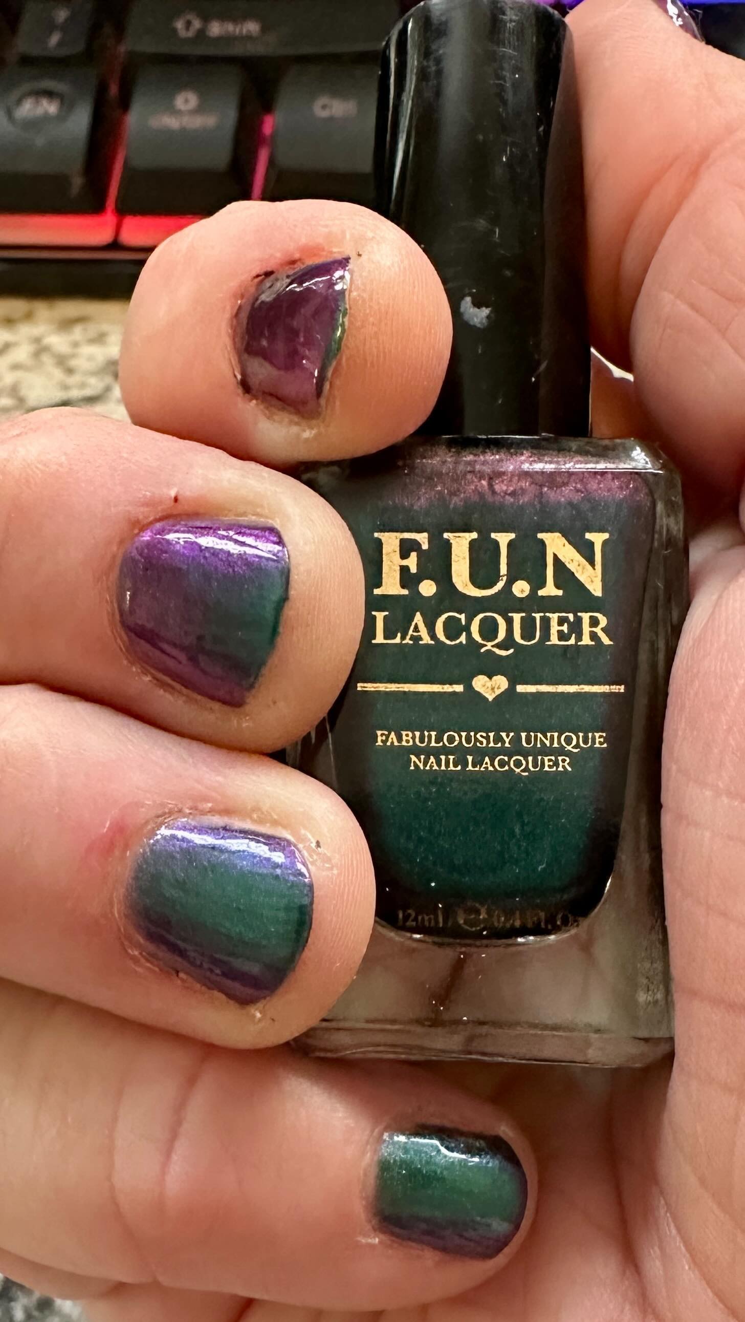 this nail polish is amazing. changed from green to purple based on lighting. #funlacquer #blessing Multichrome #nailpolish
