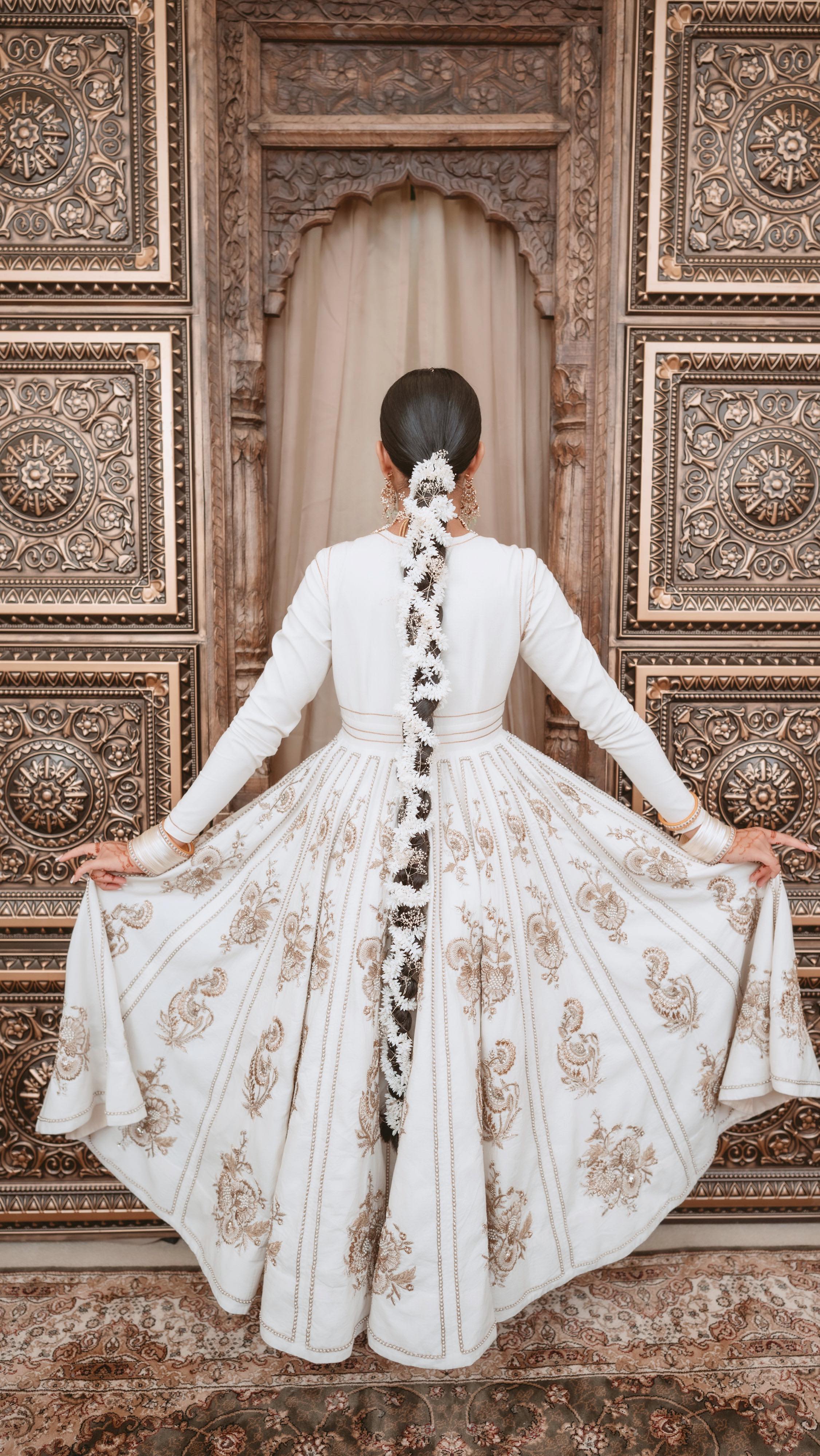 A little behind the scenes footage styling Ravneet’s beautiful long & thick hair for her wedding day✨….including the moment I had to jump on the bed after seeing the biggest spider of my life! #scarymoment
Ravneet wanted to show off her hair length, so a braid was the perfect choice. 🤍
It was a real team collaboration between us both and we both valued each others opinions to create the perfect outcome. This is exactly how I like to work with my brides, so thank you @ravster_sehra .
✨I AM FULLY INVESTED IN CREATING YOUR VISION, whether it’s a very natural glowing version of yourself, a soft glam bridal look, or something a little more edgy with a fashion editorial vibe.
I provide BESPOKE BRIDAL PACKAGES so your bridal look will be completely TAILORED TO YOU and your requirements.
To enquire please contact me via my weblink in my bio or via the email button. I’d love to hear from you. 🤍
www.kerrybaines.com/contact
✨Stunning bespoke bridal outfit designed by @19.04_bespoke
✨Beautiful Jewellery @gulmohar.co.uk
✨Cover pic/ Photographer by the amazing @kunaalgosrani (more stunning pics coming soon)
✨Beautiful backdrop @bloomsevents.uk
#bridalhair #southasianbridal #southasianbridalinspo #asianbridalhair #indianbridalhair #braidideas #extralongbraid #bridalbraid #bts #hairtutorial #behindthescenes #braid #asianbridalbraid #longhair #weddinghair #weddinghairinspo #birminghammua #birminghamhairstylist #muasolihull #hairstylistsolihull #hairflowers #jasminehairaccessories