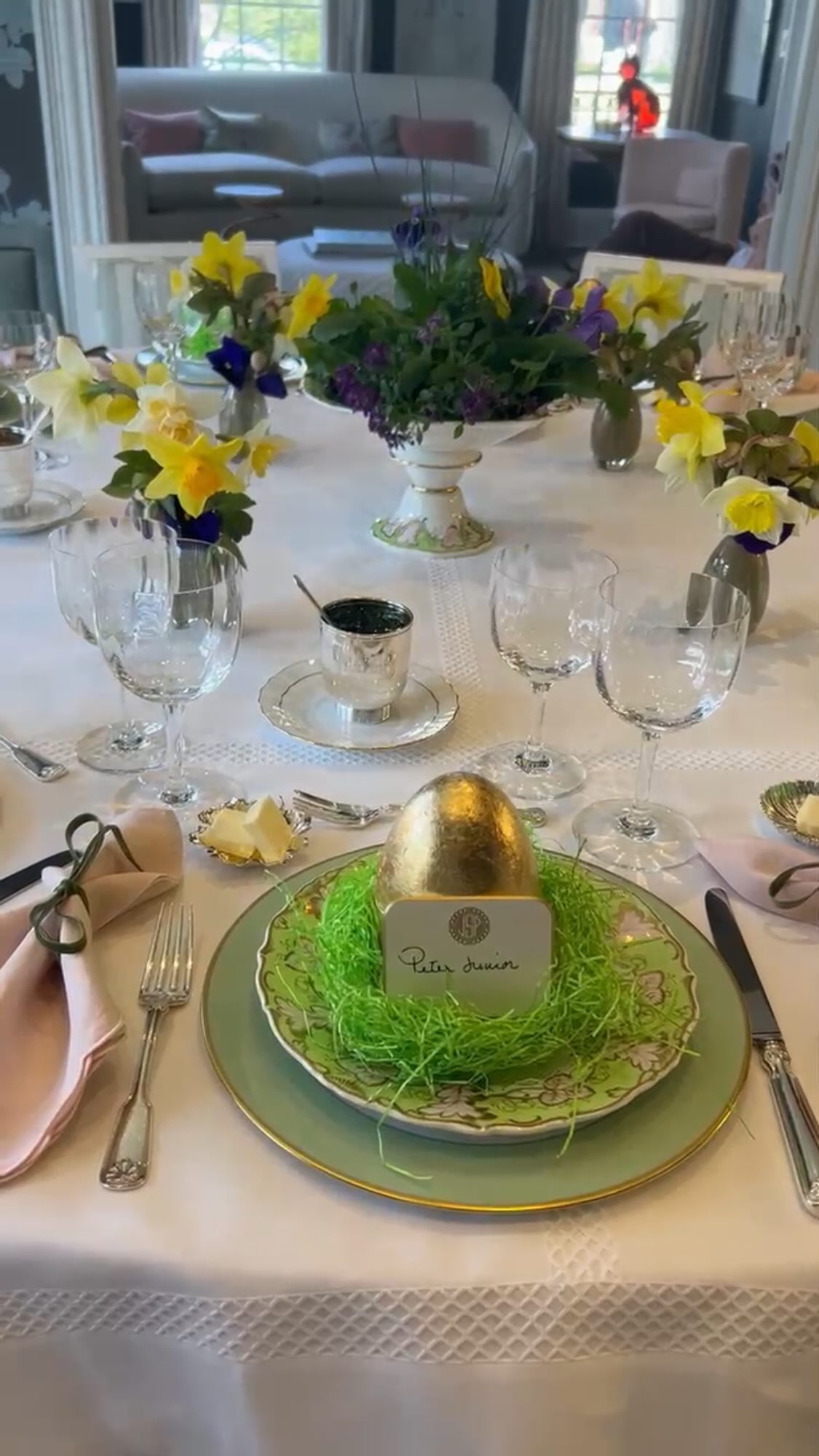 A look at how I set my Easter dinner table 💛
First I start with a bump, a flannel fabric that goes under the tablecloth that softens the edge of the table. Layered over that is a crisp white linen tablecloth.
I love these spring-theme plates with the sweetest pansies to match the freshly picked flowers from my garden. The lovely greens, purples and yellows make such a beautiful color combination for Easter, while gold trim adds a hint of glamour.
Pink scalloped linen napkins add a sweet, more casual touch to the table, especially when contrasted to the more formal salad and dinner plates. I chose a thin green ribbon to tie a bow around the napkin (pro tip: always use a dedicated fabric scissor for your ribbons that you don’t use for cutting paper or anything else! ✂️)
This @baccarat crystal has been my go-to for years and adds a beautiful touch to the table. Nothing is less appealing than a murky glass, so hand-washing and drying is always a must!
For final touches, pansies and greens in the center compote complete the spring garden look, while whimsical golden eggs hold a surprise for each guest. 🥚✨
I hope everyone has a lovely Easter!