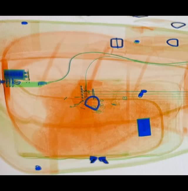 Can you guess which famous surrealist artist painted this?
Corfu x-ray machine with my guitar 🤣