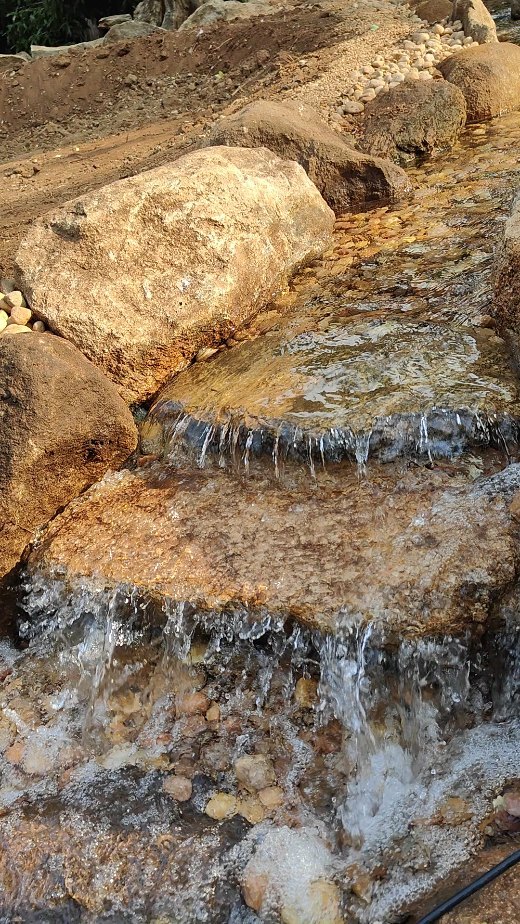 The stream that leads to the swimming pond...
What kind of bridge do we add?