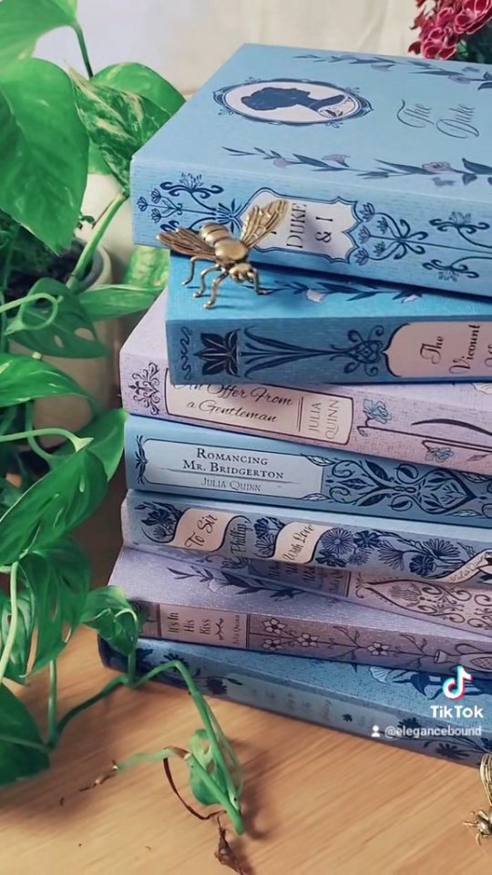 Our Bridgerton Dust Jackets are live now via our Etsy! It's time to update your paperbacks and give them the real Ton treatment! #bridgerton #bookworm #bookstagram #regency #bookshelf #books #shelfie #dustjackets #bookaesthetic #coverdesign