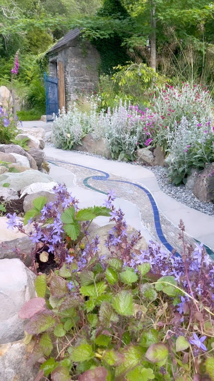 Lovely afternoon today at the official opening of the community garden in Coomhola in west Cork. Well done to everyone involved in this community project. Delighted to have one of my mosaics of the life cycle of the salmon included in the project. #drystonewall #pebblemosaic #community Coomhola Borlinn Development Association