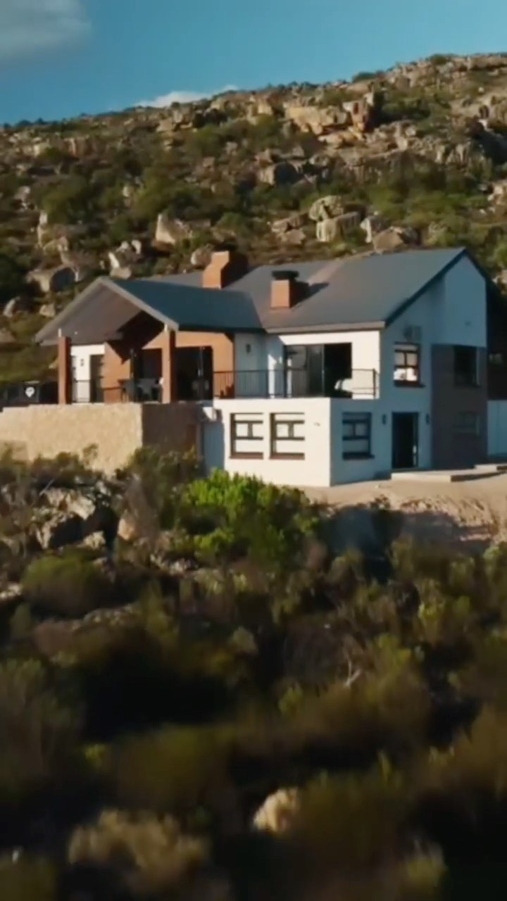 This is the Spekboom House, a project recently completed by Osmond Lange Cape Town. The project is located in Citrusdal at the Wolfkop Nature Reserve.
The house was designed to blend in with and compliment the natural and heritage surrounds. It is a 4-bedroom, open plan house that overlooks the beautiful valley of Citrusdal with a splash pool, large outdoor patio and a jacuzzi to be enjoyed in summer and winter.
Available to be reserved for a weekend away with numerous outdoor tourism activities in the Cederberg area.
.
.
.
#architecture #home #homedecor #wolfkopnaturereseve #accommodation #holidayhouse #southafricaphotography #southafrica #southafricaarchitecture #archilovers #architecture_hunter #interiordesign #interior #cederberg #southafricastay