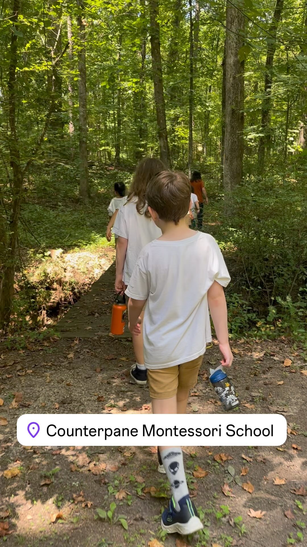 Once a week, our Lower School class takes a hike through our 14 wooded acres. As you can hear, on this particular hike, the students stopped briefly to check for crayfish from the bridge. They found some in the creek a few weeks ago and were delighted to learn their presence meant our creek’s ecosystem is thriving.
“There must be provision for the child to have contact with nature, to understand and appreciate the order, the harmony and the beauty in nature… so that the child may better understand and participate in the marvellous things which civilisation creates.”
The Secret of Childhood by Maria Montessori
#montessori #fayettevillega #takeahike #montessorioutdoors