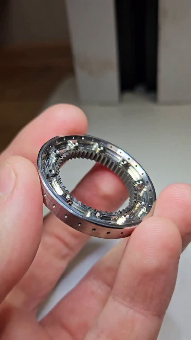 The longer you look, the more details there are!
Tiny threads, flexure cutaways, perfectly deburred edges, angled holes, rainbow surface finishes. This is what happens when you ask a watchmaker to make aerospace componentry.
