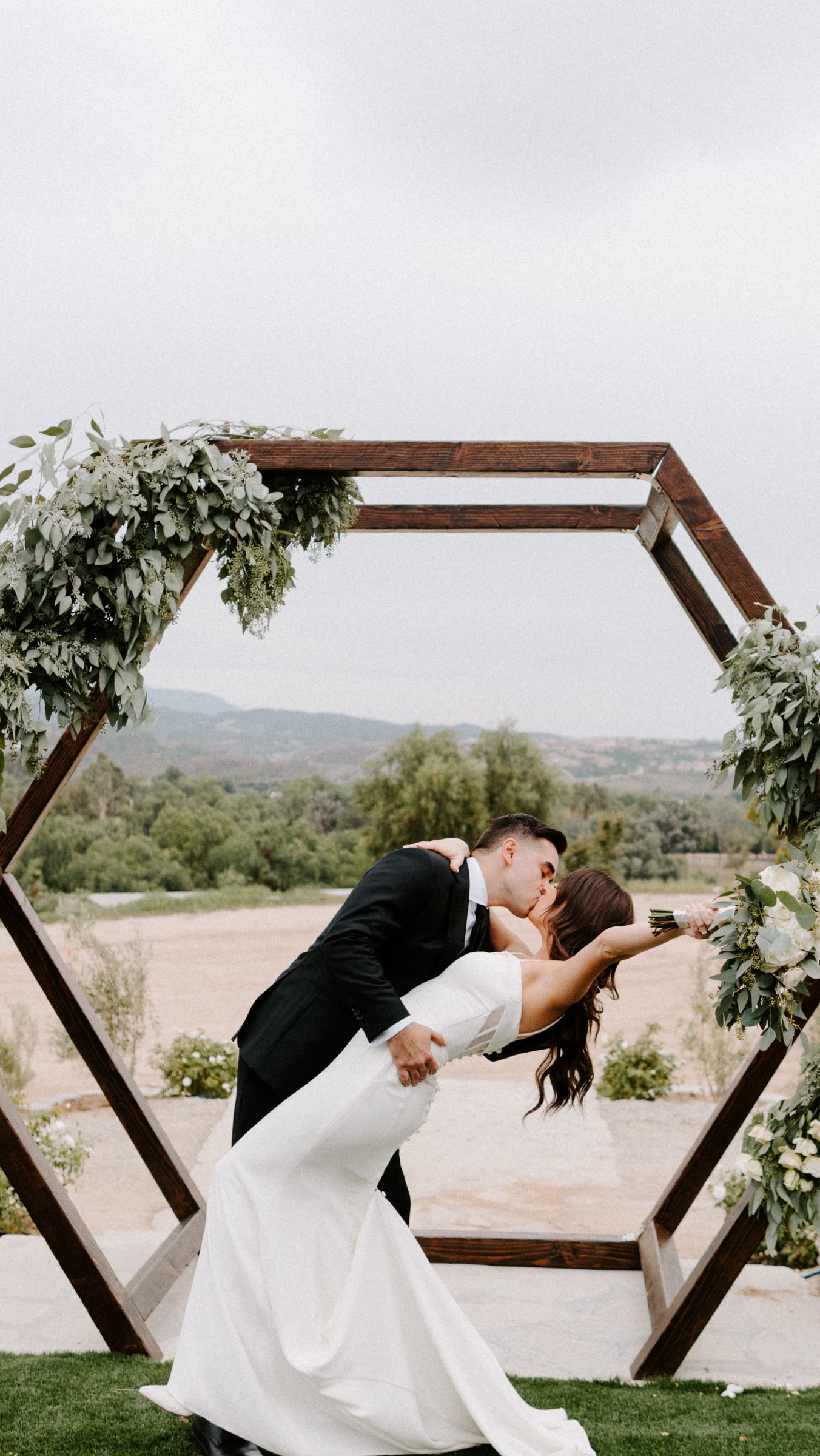 When bride and groom trust you with the design of the day, you deliver! Unpopular opinion, cherry wood ceremony chairs elevate your space rather than white plastic! #partyrentals #eventrentals #smallbusiness #latinaownedbusiness #tabletop #design #sandiego #socalbride #villa #temeculawinerywedding
