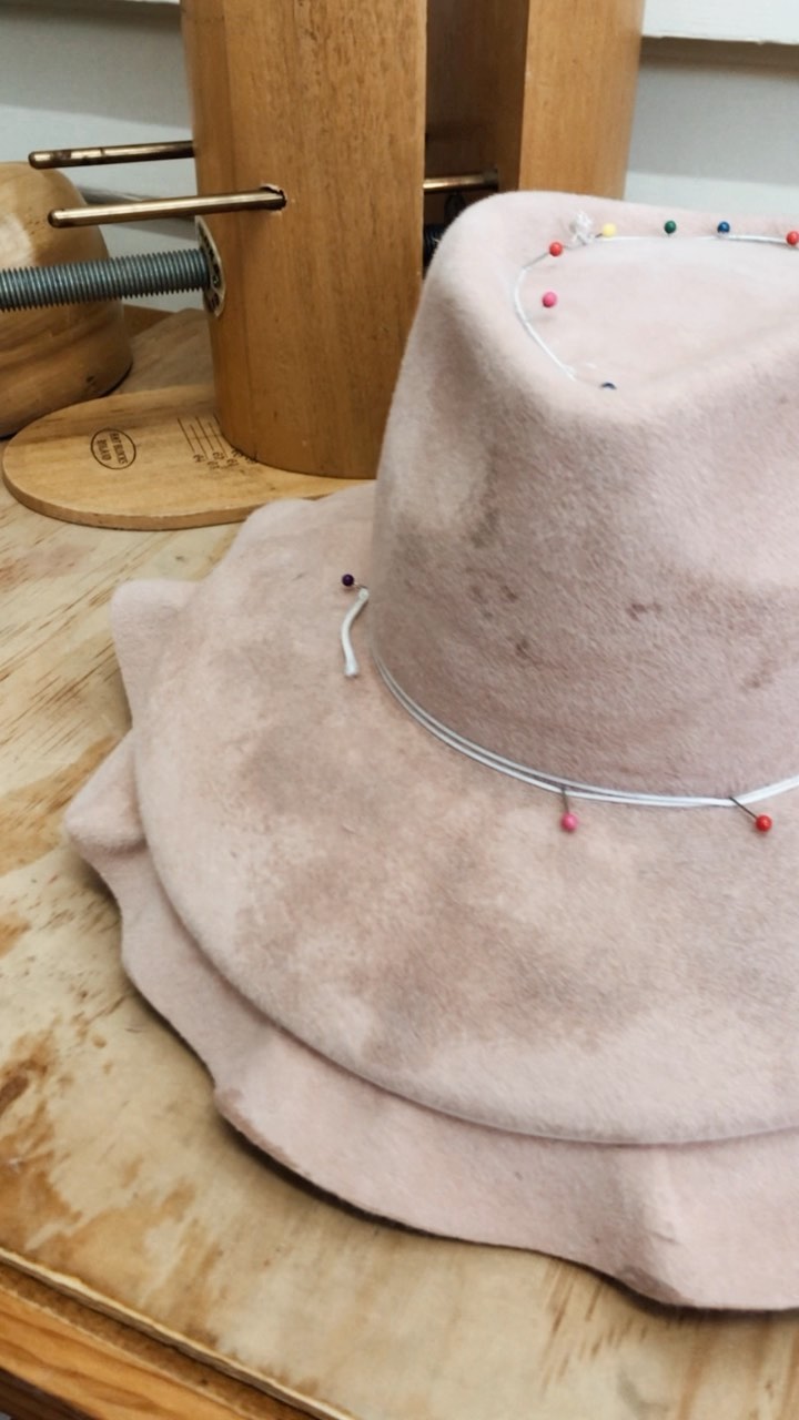 Working on beautiful custom hat today in the studio. The most beautiful soft pink fur felt will be trimmed with a delicate silk ribbon.
#millinerymagic #fortinhats #bespoke #bespokehats