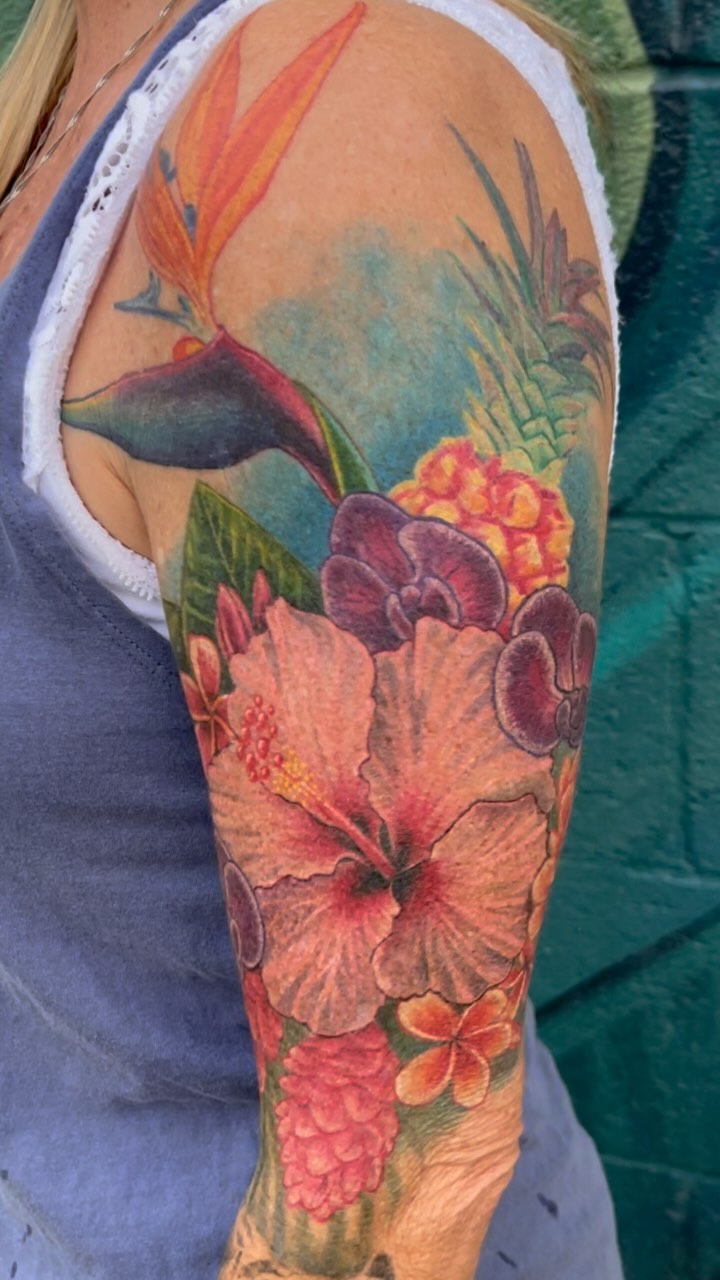 I’ve been traveling like crazy lately, and now that I’m finally sitting still, I’m finally getting around to sharing some of my recent projects.
Tropical floral projects like this will always hold a special place in my heart. My mother is an incredibly talented floral designer, and flowers like these take me back to the hours I’d spend in the coolers and green houses, exploring the beautiful alien flowers, as well as enjoying the sweet aroma.
Darci, thank you for allowing me to be the one to bring such a fun tattoo to life, and thank you for reminding me of such simple sweet memories.
If you’re looking for something like this, or a fantasy landscape, or some nerdy science stuff, it’s a great time to reach get your fall project scheduled.