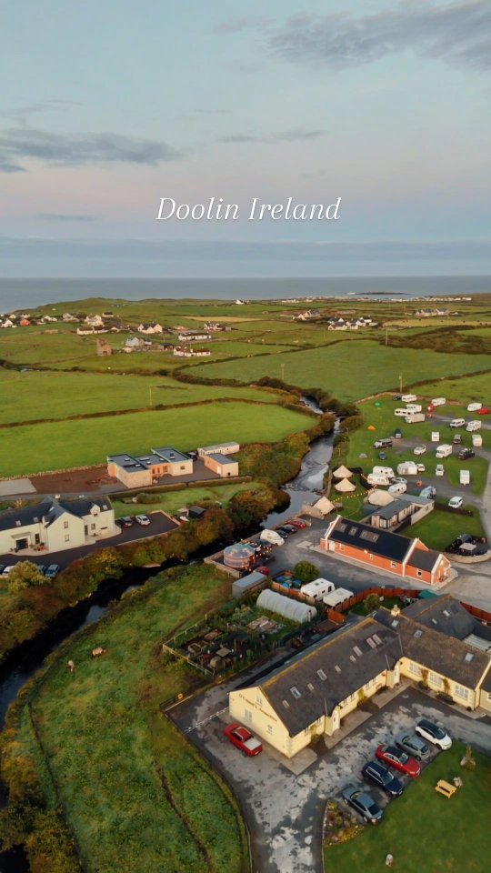 Doolin at sunrise. The village slowly wakes, bathed in the soft glow of the morning light. From above, you can see the stone cottages and winding roads stretching toward the horizon. A few days ago, we captured this quiet moment before the world stirred, and it was a reminder that the beauty of Ireland isn’t always found in the places everyone talks about.
But the night before was a different kind of magic. The local pub was alive—accordian echoing through the night, a band playing with heart, and laughter shared with old friends over carafes of wine . Doolin doesn’t just offer scenery; it offers soul.
In Doolin, time slows down, and the moments—both loud and quiet—become the ones you’ll take with you long after you’ve left.
#doolin #ireland #dji #HiddenIreland #WildAtlanticWay #DoolinNights #SunriseInDoolin #IrelandBeyondThePostcards #TravelWithSoul #OffTheBeatenPathIreland