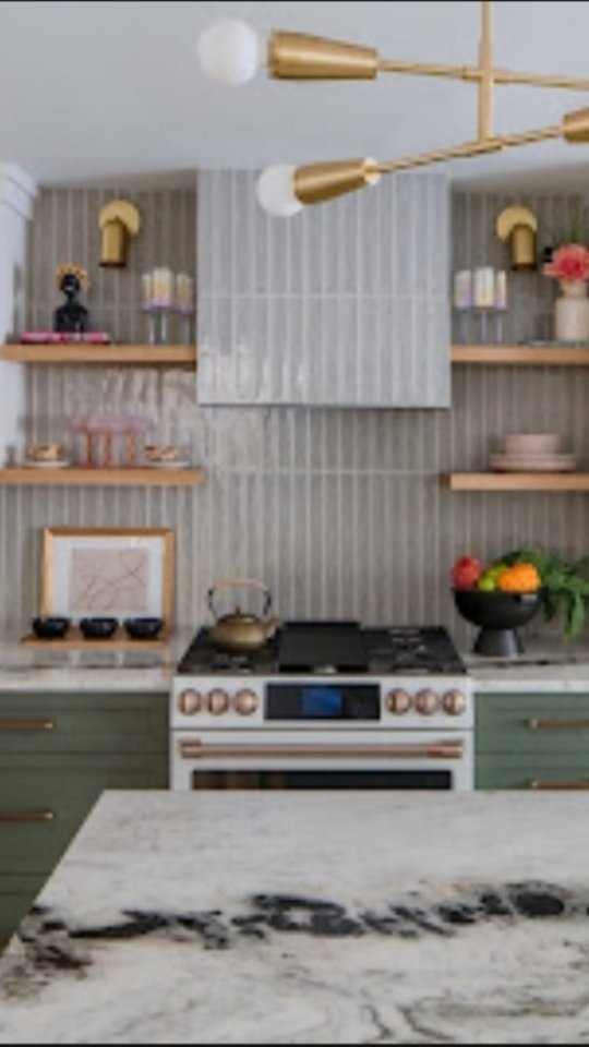 What Charles Eames meant when he said, "The details are not the details. They make the design."
A lot of careful planning goes into a successful design, and this kitchen was no exception.
โFrom the countertop veining placements
โTo the tile layout, intentional grout lines and also making sure the shelving and hood line up to the grout lines
โTo no outlets on the backsplash besides the GFCI
โ To the amount of storage clients need based on habits and what (amount of pots, dishware, small appliances, food etc), they have...and sometimes we need to suggest decluttering.
โ To adding an overhang to the island for an extra stool that remains in storage for when my client is entertaining as this is the only dining space in this 660 ft condo.
Everything is thought of and calculated, sometimes pen on paper!
Design is not just "SO FUN" it's a lot of hard work and intentions, but the end results are worth it, and yes, even "fun" lol