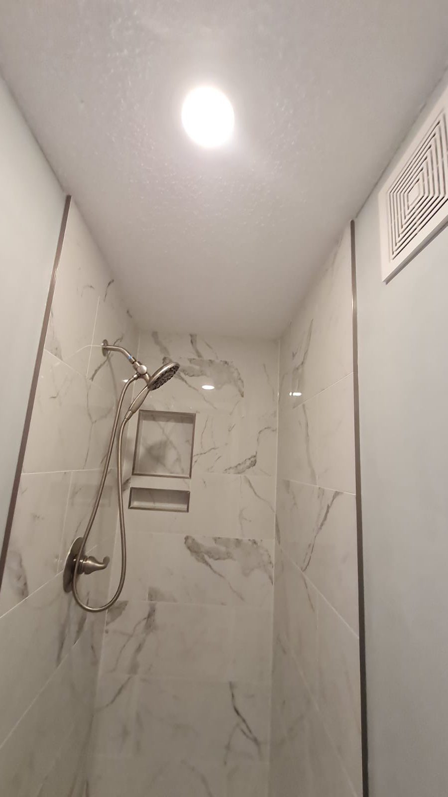 ๐ฟโจ Need an extra shower at home? Just let us know! Weโre here to help! ๐ช #HomeImprovement #ExtraShower #Homeremodel #homerepairs #bath #bathroomdesign #generalcontractor #schlutersystems #renovationproject #beforeandafter #raleigh #cary #apex #sanford