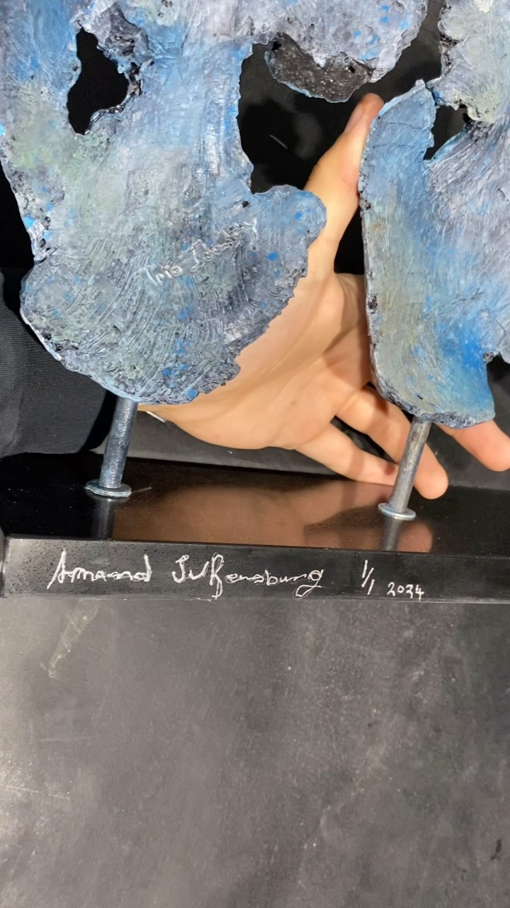 Artist's final touches: signed, dated, and editioned before delivering the sculpture to the gallery
#sculpture #limitededition #resinsculpture #trioidentity