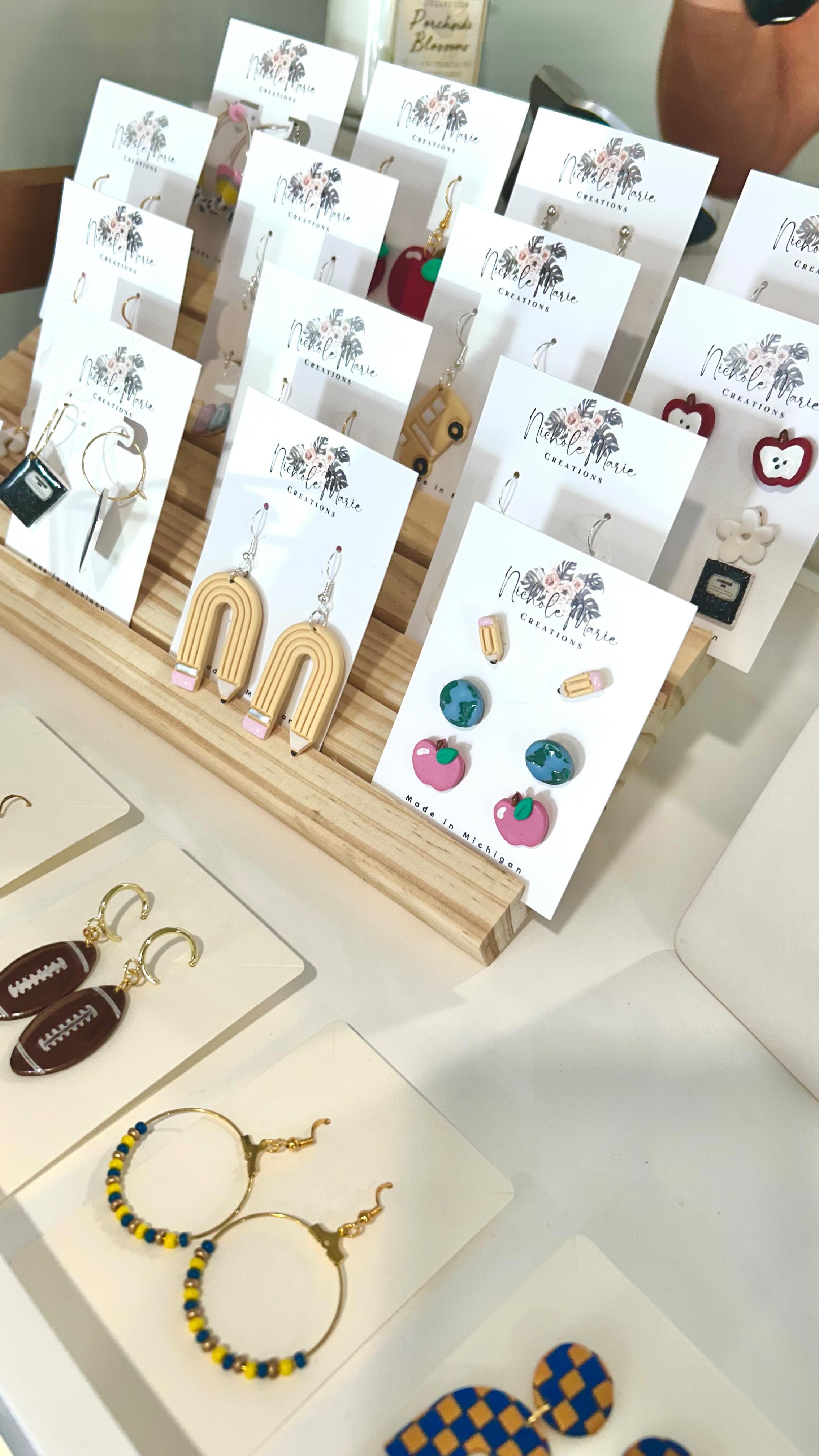 I am so excited to let you all know that a local, very talented artist joined the shelves today ❤️
Meet @stephsuehart
She hand makes all of these earrings by scratch!
✨Her earrings will be displayed at the salon and all are welcome to come snag these adorable pieces.
So while your getting your hair don’t and want to take a look or just swinging by to pick up a pair, they will beautifully displayed @ Refined Reflections.
@nicholemariecreations