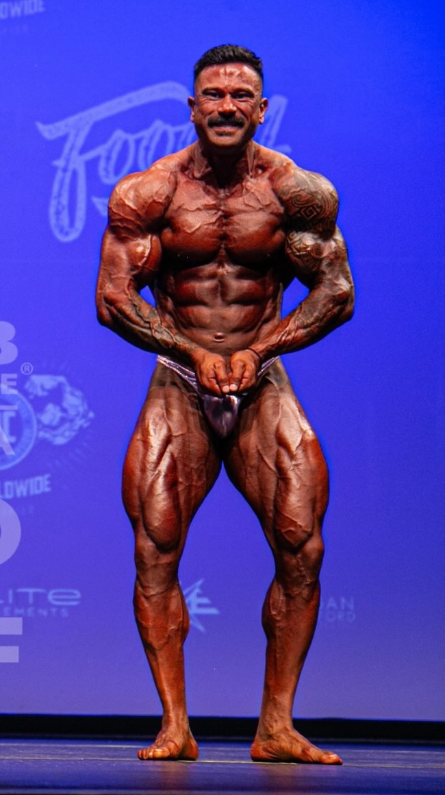 .
🎥 Behind the Scenes: Purple G-Banger Edition 💜
So, we filmed this epic video with @c.m.visual between the Vic Champs and Nationals… and yes, before you ask – I was in a purple G-banger. #PeakFashion 😂
But amidst all the cheeky wardrobe choices, there’s a serious mindset that drives me: always striving to be better, aiming for that next level, but also taking time to reflect on what’s already in front of me.
It’s easy to get caught up in chasing more, but to remember your blessings and, more importantly, be a blessing to others along the way.
Now, let’s talk bodybuilding! After pushing hard to make weight for the classic division, I had to sacrifice some size and fullness. But moving forward, we’re dialing in the focus – no more holding back!
It’s time to grow and bring the biggest, most complete package to the stage. Classic was fun, but now it’s time to go all-in and show what’s possible when size isn’t a limit!
🔥 Ready to see the journey? DM me if you want tips, advice, or just to talk about that purple G-banger moment 😉