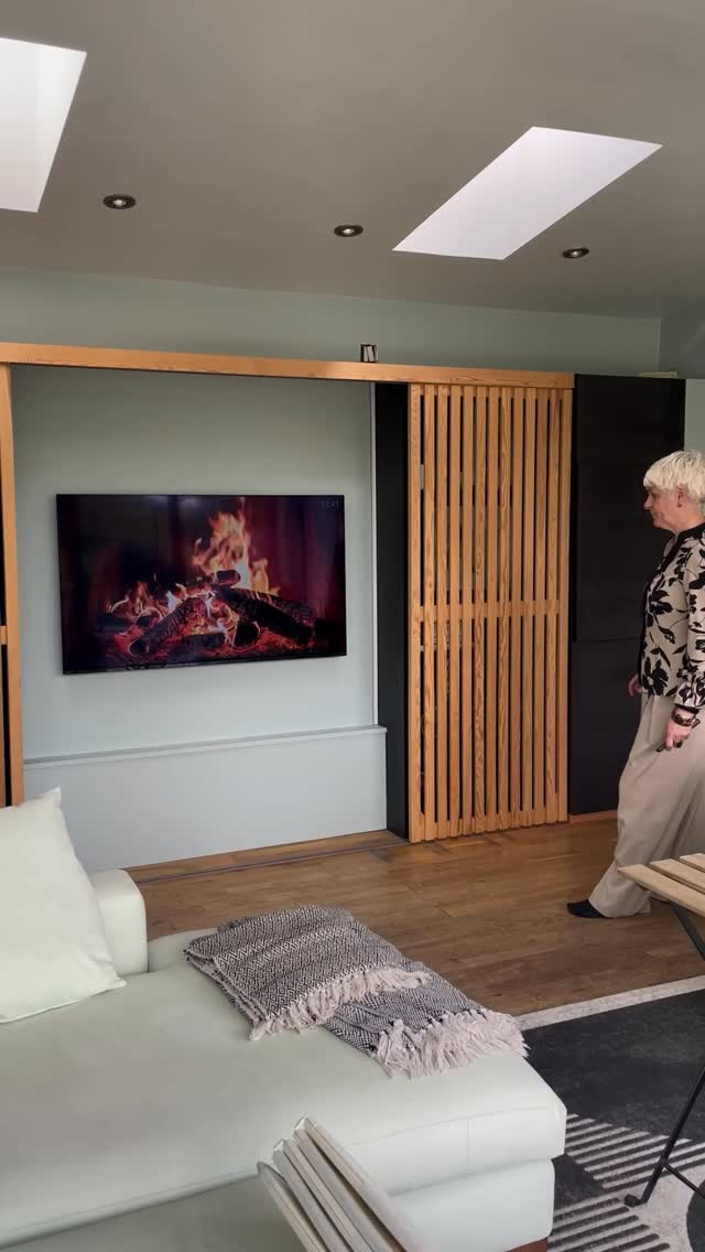 Designed with intention — these custom sliding doors allow the TV to disappear when not in use, creating a calm, curated space with open shelving on either side.
Our favourite part about this feature however is making use of the TV to create ambient lighting with a warm glow behind the closed vertical sliders.
Tag someone who’s space you think these would look great in.
#InteriorDesign #BespokeJoinery #LivingRoomInspo #DesignDetails #TVConcealment #FunctionalDesign #ModernInteriors #WoodworkDesign #SlidingDoors #BlissInteriorsStyle #CustomStorage #FormMeetsFunction