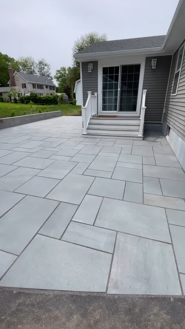 What a makeover! This stunning bluestone patio completely revitalized our client’s outdoor space and we received a 5 star review from them as well 🙏. *Wait for the before video at the end of the video! 😳 #outdoorliving #happycustomer patiosbyanthony #BluestonePatio #PatioGoals #BackyardMakeover #HardscapeDesign #BeforeAndAfter #LandscapingLove #OutdoorLiving