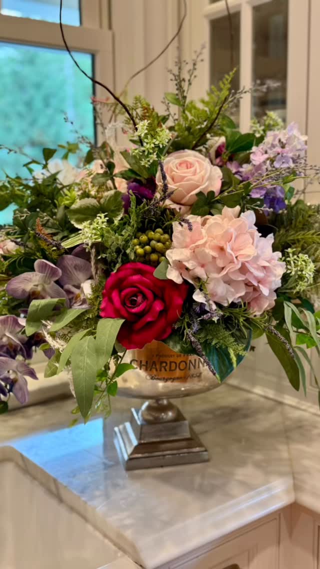 It’s been a busy few weeks but the wedding reception I planned and hosted was an absolute success! I worked very hard on florals and decor to make the basic hall space we had rented feel beautiful and special. For florals, I used all high end faux except for the bridal bouquet and boutonnière. This is was a very conscious choice, I wanted to be able to reuse the florals and I needed to provide a lot of impact through decor. Faux was the only choice that made sense and I was very pleased with the way it turned out. It was such a special day!