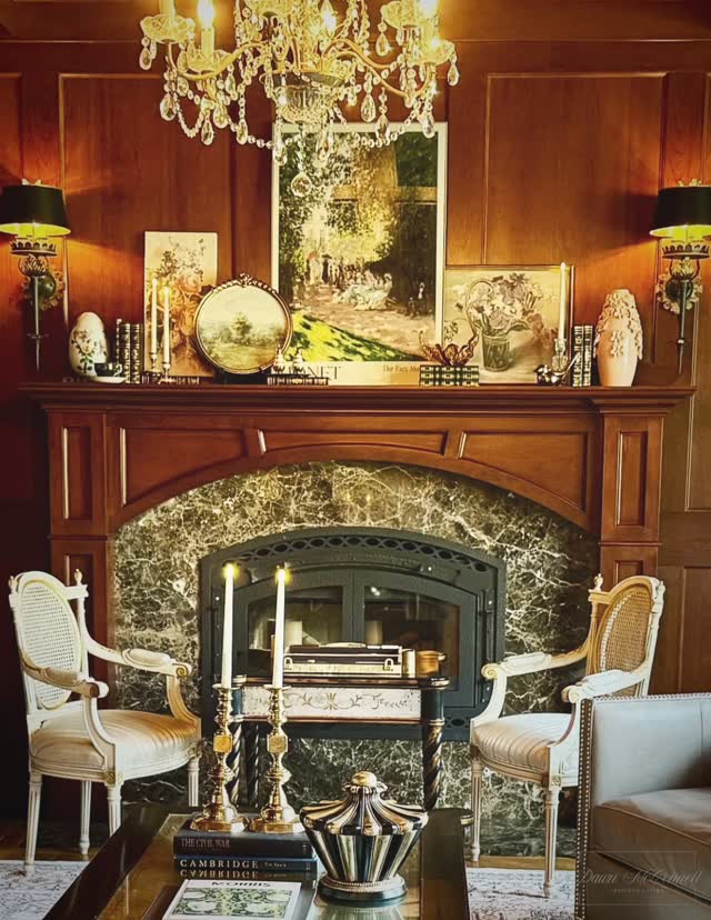 Happy Monday!
Today I want to share with you the mantle decor in the library of my home. The library is directly to your right as you walk into the house and it is often the room my guests choose to sit in for pre-dinner drinks. For this mantle, I always like to challenge myself to create an artistic focal point that sets the mood for the season or event I am focused on at the moment. I enjoy playing with colour, scale and artful groupings on this mantle as the room itself can feel very formal and it can be somewhat of heavy space. The ceiling is also wood, a coffered masterpiece, is absolutely stunning but the room can feel very dark.
This is my summer mantle, I wanted to bring our 35 acres of rolling land into the space. I chose pink as it feels inviting and warm. Nothing is particularly expensive or precious, some pieces are from Homesense others pieces like the egg are from our travels in China, and some are collected pieces from my vintage china. I wanted it to feel inviting, more of a parlour energy. I host many house guests and I always invite them to explore and enjoy each room. We often use this room for quiet conversation with friends or family, reading in this room is so special, I love to have my morning coffee at the desk in the front window, and the backgammon game is used by our guests a lot. I know this mantle may be cluttered or “too much” for many people but I love it. Thanks for letting me share it with you.
#dawnmcconnellinspiredliving #library #mantle #mantlestyling #home #homedecorating #décor #homelibrary #dyidecor #selftaught #vintagestyle #vintagechina #stylingwithbooks #yegdesign #yeg #yeghomedecor #traditional #traditionaldecor #elegant #fireplacedecor #fireplace