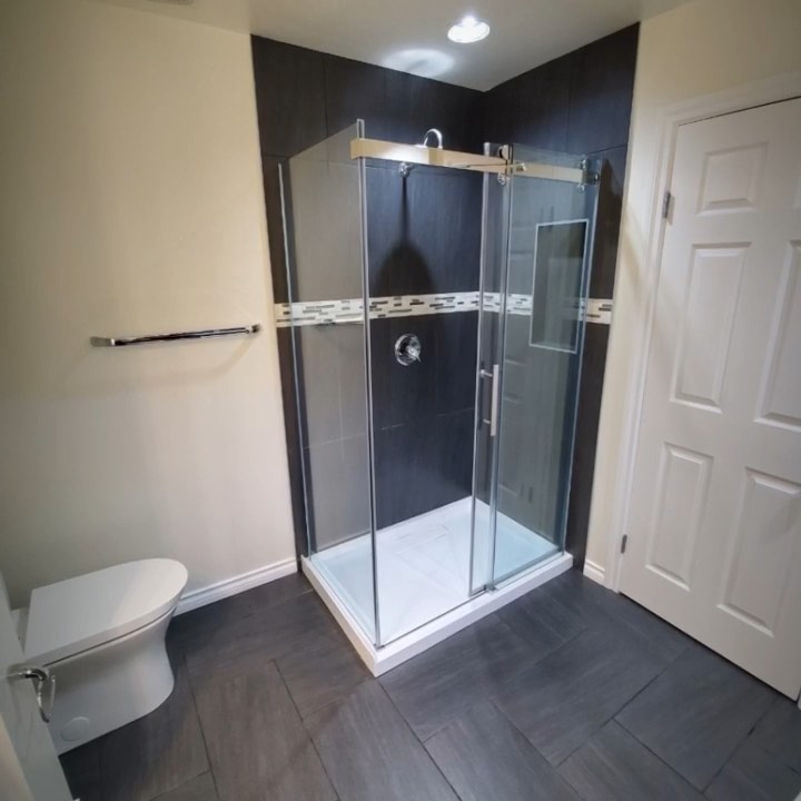 This four piece bathroom renovation was a total demolition project. The back wall was moved, a pocket framed for the vanity and a walk in shower installed. The soaker tub gives the bathroom a modern feel to go along with the open concept of the renovation.