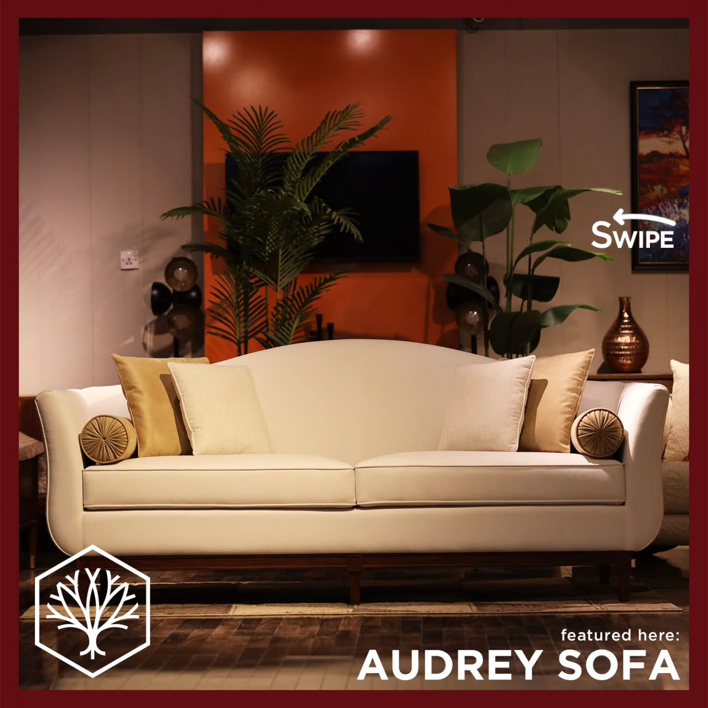 Introducing the Audrey Sofa by Mirari—a piece that blends graceful design with refined comfort. Inspired by its namesake’s elegance, it features a soft camelback, sculpted arms, and a neatly divided double seat in luxurious upholstery. Resting on a dark-stained, hand-carved sheesham wood base, it exudes timeless charm. A pair of bolster pillows complete the sophisticated look.