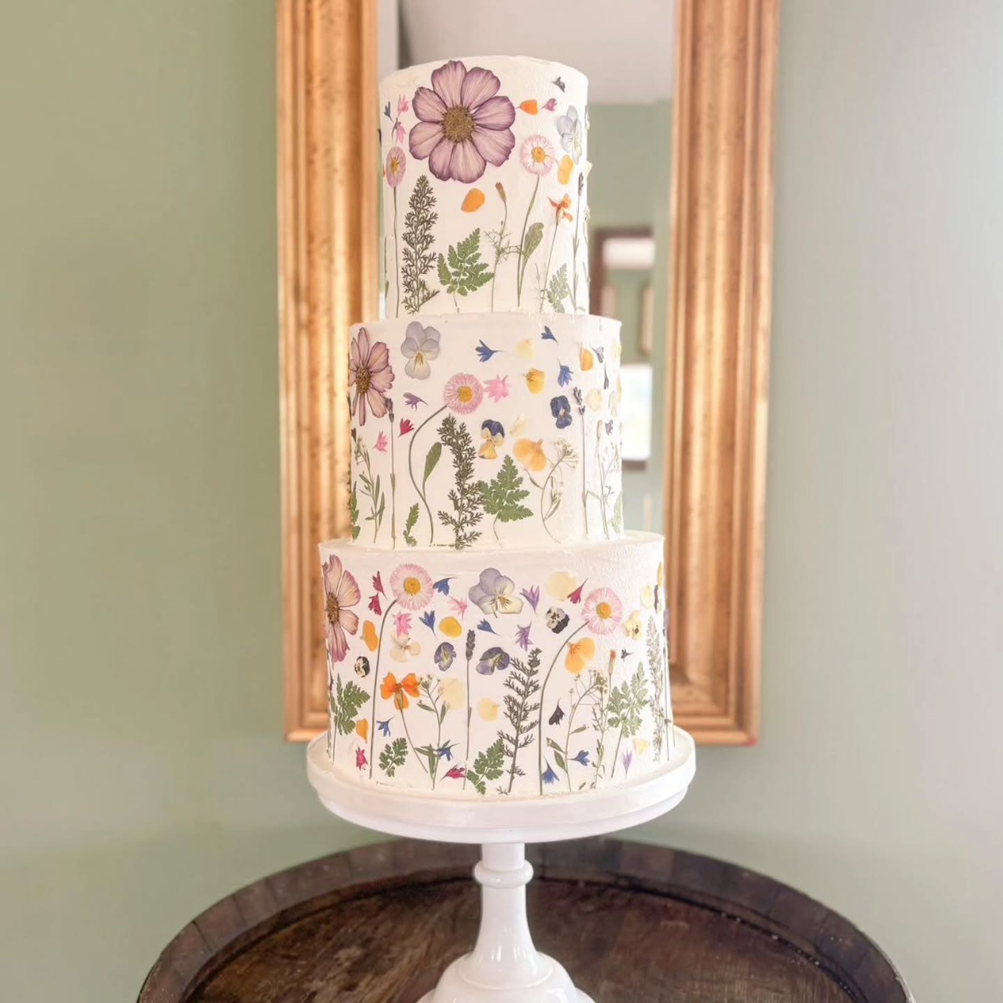 An elegant three tier masterpiece
This gorgeous cake by @theprettycakecompany is dressed in layers of soft summer meadow blooms - blush pinks, buttery yellows and delicate blues.
Timeless elegance, with a playful burst of meadow magic.
#cakedecor
#weddingcakes
#botanicalcake
#weddingmagic
#pressededibleflowers
#pressedflowercake
#weddingcakeinspiration