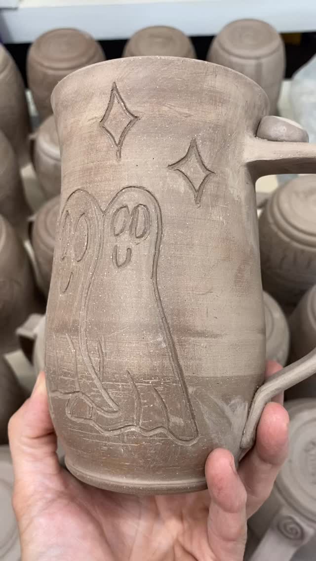 I am having so much fun carving fall and Halloween themed mugs. As long as everything goes well I plan to celebrate by sharing this work on October 1st!
What you see here:
1. Ghosts that I’ll glaze the colors of the rainbow 🌈 I love how colorful these come out!
2.Pileated woodpecker that I will glaze fall colors on the trees in the background. 🍂
3. Box turtle finds a pumpkin patch, hopefully not mine 😆 🐢
4. Fat Cat showing his belly, trying to be cuter than pumpkins 😆 This might be my favorite so far.
5. Fluffy cat with an oak and a maple leaf. 🍁 🐱
6. Witch silhouette with a cat on her broomstick in front of the full moon. 🧙 🐈⬛
7. Crow in a pumpkin patch at night. I love this one.
8. Double spooky owls in front of a full moon, inspired by vintage Halloween decor.
9. Cat wearing a witch hat and she’s propped up on a pumpkin. 🎃 I only made a couple of these last year and I thought it deserves more.
10. Pumpkin patch at night and I added stars and a moon because I was thinking about Linus missing the festivities of trick or treating but really, a pumpkin patch under the stars sounds pretty nice to me.
The next round, I’ll be carving haunted houses! They are getting their bottoms trimmed today.
#halloweenmugs #autumnmugs #autumnmug #mugcollection #ceramicsofinstagram #handmadepottery #appalachianartist