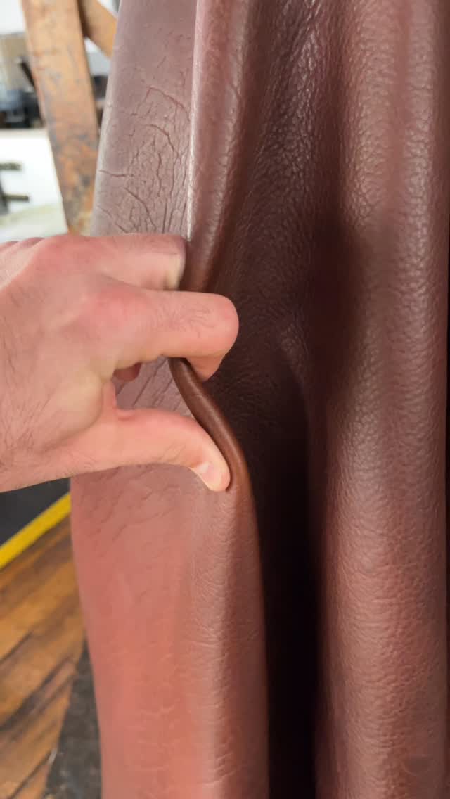 Walnut Mammoth Bison on the oil/wax machine. This fully aniline leather gives you the natural rugged character of bison with a nice pull-up #madeinamerica #leather