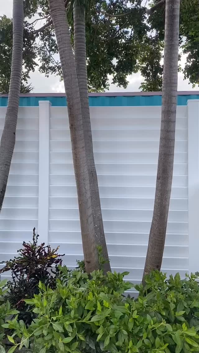 8’ high Louvered Vinyl fencing. Aesthetically, pleasing, full privacy, and slight ventilation. This client needed the extra height to block the view from the commercial property behind their home. #fencesmakegoodneighbors #pvcfence #knowafenceguy #knowafenceco