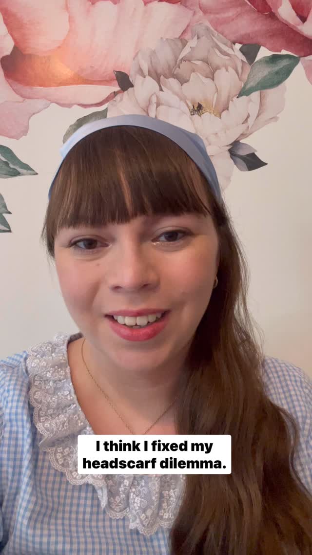 I fixed my weird head shape issue! This is very much a me and my head issue (nothing like having jaw surgery to make you aware of your head shape!) as I canāt really wear any headband or headscarf even though I make them but now I have a solution and can wear these cute silk headscarves
I did test this at Salad Days and can confirm my headscarf stayed happily on my head. And it probably isnāt a coincidence that I also sold the most headscarves at a market while wearing one as any time someone looked confused by them in their little basket, I could point to my head and show them irl!
Next thing, decide which other colours I want to wear, especially for autumn/winter markets, and buy more matching coloured clips! Burgundy or red gingham are high on my list. Which colour do you think I should pick for autumn?
Video description- Jo, a white woman in her thirties in a blue and white gingham dress and wearing a pale blue silk headscarf, talks about using hair clips to secure her headscarf.