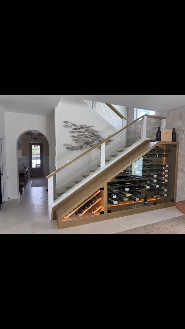 Custom wine cooler all hand built in our shop, the cooling system is concealed under the stairs and vented to the exterior. Not the easiest of installs but definitely worth it in the end. This was actually the homeowners design and with the help of @vineyardwinecellars we figured out how to make it all work. #delmarconstruction #homebuilder #homebuilding