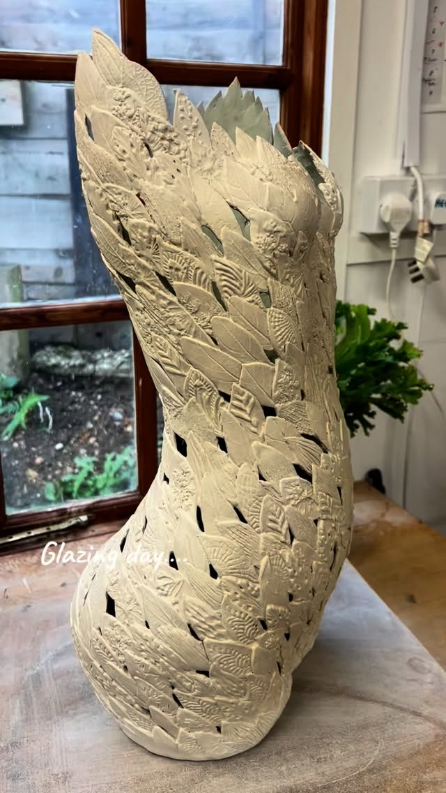 So finally, I’ve got my brush in hand and I’m applying glaze to this leafy ceramic sculpture. You can imagine that glaze will escape through some of these little gaps that I’ve purposefully created. So once she’s had her total layers of glaze applied, I will go over her carefully with a sponge and check every single space that it’s clean and give her a thorough check before she dives into the kiln. This leafy sculpture is built free hand leaf by leaf. Maybe it was a slightly mad idea to start with, but I’m afraid I get lost in the making process with these pieces and it gives me so much joy as they finally grow to full-size over a couple of weeks of working with the clay. No support needed in the making process, it’s just a steady process that can’t really be rushed. This female sculpture will be fired at a high temperature which will make her more robust, as she is extremely delicate.
#clay #sculpture #smallbusinesssaturday #ceramicart #pottery