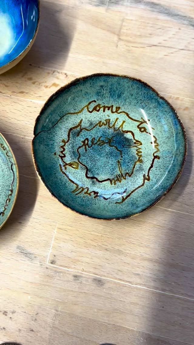 I’ve spent some time warming up my “handwriting flow” so that I’m ready to take my brush onto the leafy ceramic sculpture I’ve spent the last month or so making.
You can imagine that I want to feel confident as I take the brush and start decorating the sculptural piece. There’s no way of doing any sketch work as it were! I’ve just got to start confidently and go with it. I will spend some time holding the sculpture in my hands and working out angles at which my hand can move more freely. All of these decisions will help me work out how the design will flow into the piece. Starting by decorating these small pieces is essential. I really enjoy making each of these pieces unique and I hope that the little bowls will have a little message for somebody that will touch their heart, as they do mine.
#ceramics #pottery #ceramicstudio #ceramicpendants #ceramicdishes