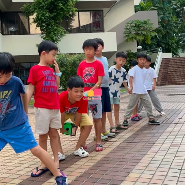 🌈 Big Moves. Big Smiles. Big Growth. 💪🏼
And that’s what makes our Kinderians unstoppable! 🌱
This week’s outdoor Hula Hoop & Ball Relay wasn’t just about who finished first — it was about how each child moved, cooperated, and adapted along the way. With hoops, balls, and plenty of laughter, our Kinderians strengthened their gross motor skills through active play that encouraged balance, coordination, and teamwork.
Each turn of the hoop required focus and rhythm.
Each pass of the ball demanded trust and timing.
Each giggle along the line carried the sound of growing confidence.
Behind those playful movements were developing muscles, sharper reflexes, and minds learning how to problem-solve together. It’s in moments like these that physical play transforms into something deeper — a lesson in perseverance, patience, and partnership.
Because when movement meets meaning, children don’t just grow stronger —
they grow surer of themselves. 💫
💛 #KinderGrowth #GrossMotorSkills #LearningThroughPlay #HulaHoopRelay #KinderiansInAction #MovementMatters #ActiveLearning #ChildDevelopment #AfterSchoolWithPurpose #WholeChildGrowth #TeamworkAndConfidence #SingaporeStudentCare