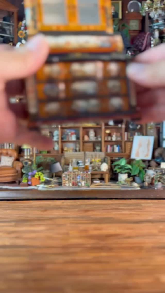 STUNNING masterpiece in miniature by Renee Isabelle in 1/12 scale is part of my latest estate auction happening now in my eBay store (link in bio to bid now, auction ends Sunday during the 7 PM ET hour. Standing at almost 9 inches tall, this hand painted wood cabinet has several drawers and upper doors with a bowfront curved center drawer with the detailed Seascape likely depicting 17 century Europe, perhaps Spain. Seems like this are painted on panels throughout the cabinet with painstaking detail and brilliance along the front sides and top which has an intricate architectural detail highlighted by perhaps a Spanish noble woman. Delicate florals and vines, accent the structure bringing all of the elements together to gently take your breath away.Swoon