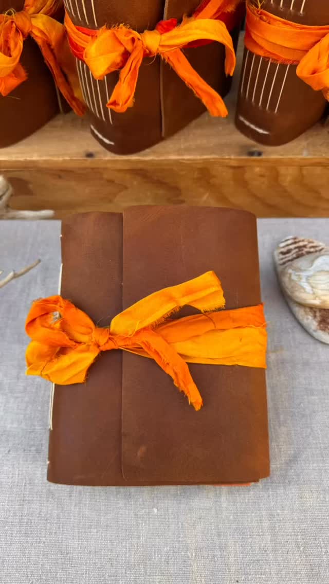 Shipping out a WISH-FULFILLING TREE STORYTELLER to be tucked away until Christmas morning! What a lovely journal choice to start a New Year!
There is a tree in ancient lore, said to grant the heart’s deepest desires to those who sit beneath its branches, dream in its shade, and whisper their longings to the wind. The Wish-Fulfilling Tree Storyteller is a tribute to that sacred magic—the power of dreams, intention, and the stories we weave into existence.
This journal features the beautiful marbled designs of Jemma Lewis, swirling freely like the leaves of an enchanted tree caught in a golden breeze. Paired with handmade papers from around the world, textured and rich with possibility—each page is a vessel for your wishes, musings, and moments of inspiration.
Let this Storyteller be your sacred space for poetry, dreams, and the quiet magic of intention. Sit beneath its pages, write your wishes, and watch them take root.
Available on line (link in bio) and at the Edgartown studio.
#WishFulfillingTree #MarbledMagic #JemmaLewisDesigns #LeatherBoundBooks #ArtJournal #MemoryKeeper #VineyardArtisans #HypatiaBookArtsMV #HypatiaOnTheVineyard #FindYourStoryAtHypatia