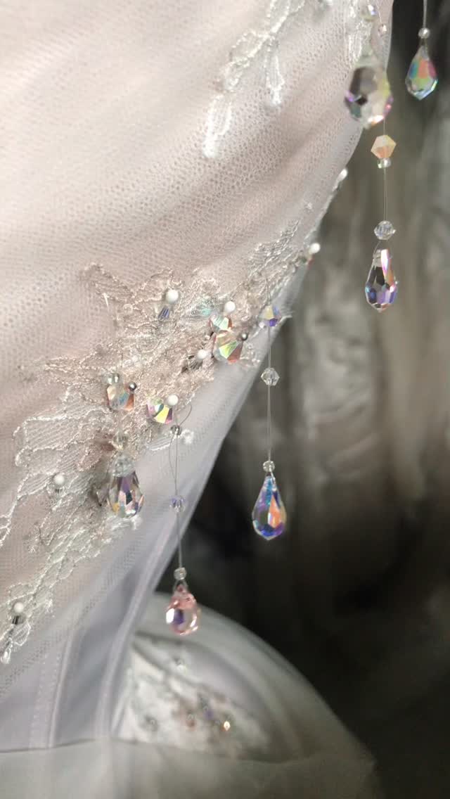 • Seraphina •
When I began embellishing this corset, I was lost in the possibilities - feathers, tulle tufts, even pyrite nuggets - nothing felt quite right. Each detail was beautiful, yet none captured the delicate, weightless feeling I imagined.
Then I found it.
Crystals that shimmered like captured starlight, subtle at first until they scattered iridescent sparkles with every movement. It was as if the corset finally came alive!
#EmiahCouture #Emiah_Seraphina