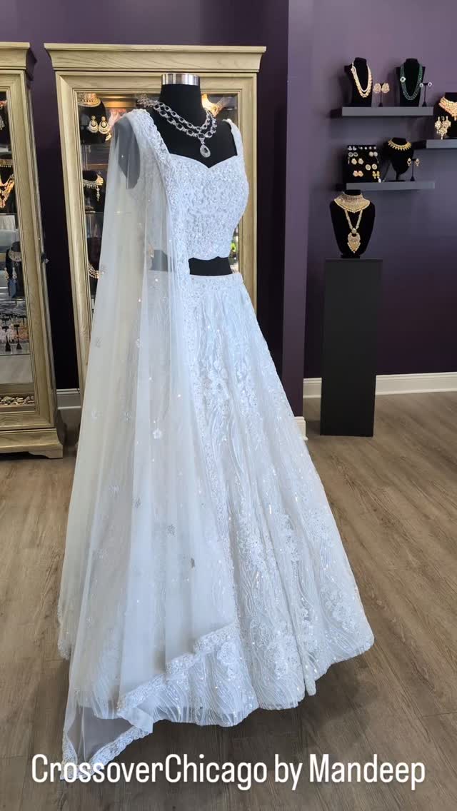 Ayesha's bridal lehnga was designed and adorned with intricate white beadwork that catches the light with every step. The look blends timeless elegance with delicate craftsmanship, creating a modern fairytale moment for the bride’s special day. Thanks @ayeshakrovi ❤️❤️
Outfit:@crossoverchicago
Planner:@burstweddings
Photography:@jordanaveryphotography
HMUA:@rarebirdbeauties
Florals:@vetiverandvine_beverly
Mehndi:@nidaz_henna
To design your bridal or partywear outfit
Email:mandeep@crossoverchicago.com
#whitebridaldress #bridallehenga #fashionstyle
#CustomOutfit #fashionista #bride #bridalinspiration #weddinglehnga #fashion #desibrides #punjabibride #pakistanibride #weddingparty #whitelehnga