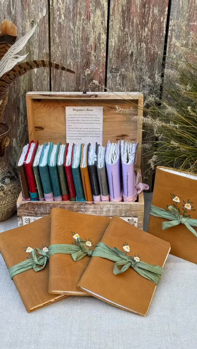 Bound by Love, Spanning Generations
A lovely woman came by my studio looking for a special book to bring to her new granddaughter’s naming ceremony. She chose a very pretty lilac Hypatia’s Rose l– a perfect selection to highlight this special occasion. Beautiful handmade cotton rag paper wrapped in a mulberry paper filled with rose petals, bound into lovely leather, each cover hand-painted with petit floral designs, and wrapped with sari silks.
The new granddaughter bears the name of her great-grandmother who was quite a lover of nature, and thus many of her beautiful writings in original letters will be included in the Hypatia’s Rose memory-keeper. What a beautiful way to weave generations together through memory, love, and reflection.
Here’s to stories that span generations, bound with love and preserved for lifetimes to come.
Read my Blog about Creating a Legacy Journal: Preserving Life’s Memories and Wisdom for Future Generations on my website
#MemoryKeeper #NamingCeremony #StoriesThatLast #HypatiasRose #BoundWithLove #GeneraltionalStories #HandmadeJournals #FamilyConnections #LegacyJournals