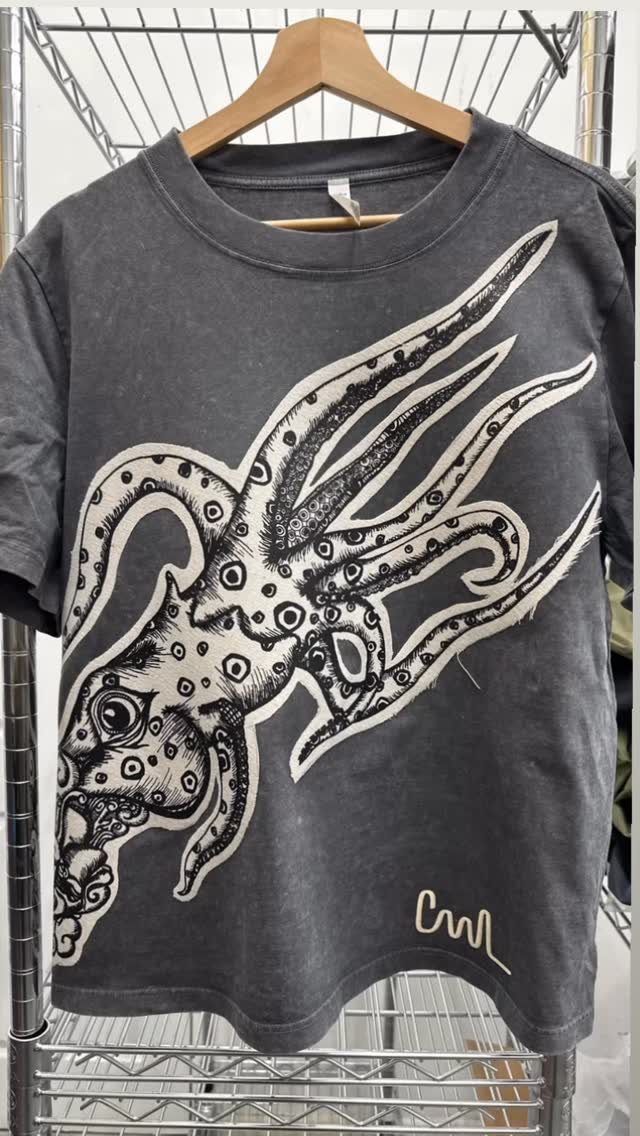 Today felt special.
I haven’t designed one of my own pieces in a while, but this funky squid finally made its way from my sketchbook to a T-shirt.
I originally drew this guy in pen + ink — a mix of fine lines, heavy dots, and a lot of patience. Printed it on canvas first, then used the laser to cut the patch and my signature CAAL (Color And Absurd Life), which is my personal brand and a reminder to create boldly.
Proud of how this one came out. More of my own designs coming soon. 🦑🔥
– Gustavo / Inspiration Print #art #draw #pasadena