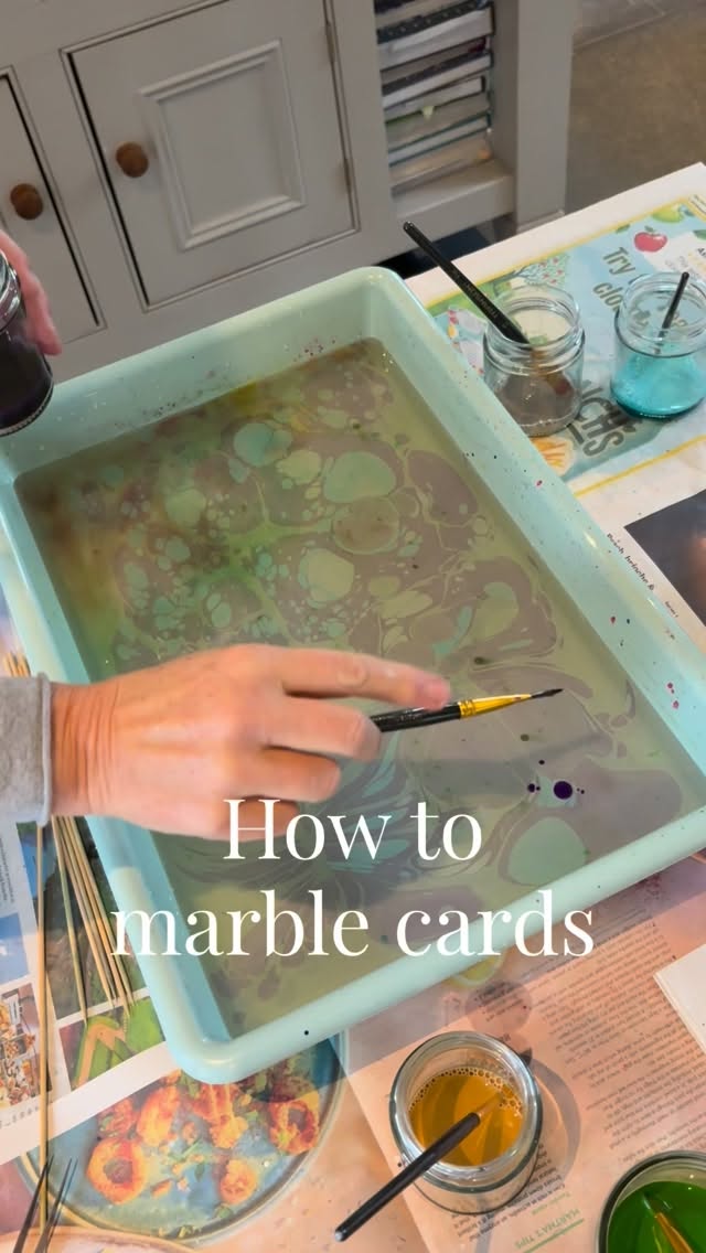 Yesterday I spent the whole day marbling. Here’s a purple, silver and turquoise pattern making its way onto card.
I love this colour combination - watch until the end to see the finished product.