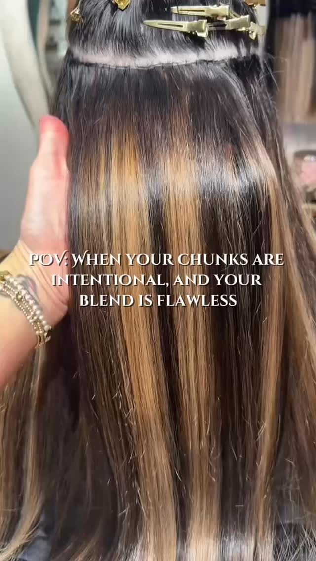 Wait… people still like chunky highlights?”
Yes. And sometimes they need them. 💁🏼♀️✨
This client didn’t come in asking for subtle. She wanted bold, dimensional, and defined. So when I custom-colored her wefts, I leaned into chunkier placement on purpose.
Here’s the thing:
If everything blends too seamlessly, you lose the pop. The brightness melts into the base, the depth disappears, and suddenly it’s just… beige.
But when a client wants those “wow” moments throughout their ends, I strategically add chunkier pieces to give that contrast. So when the light hits just right, boom 💥 you see every bit of that hand-painted magic.
So yes, the chunks are intentional.
And no, it’s not 2003 it’s custom-colored 2025, baby. 😏