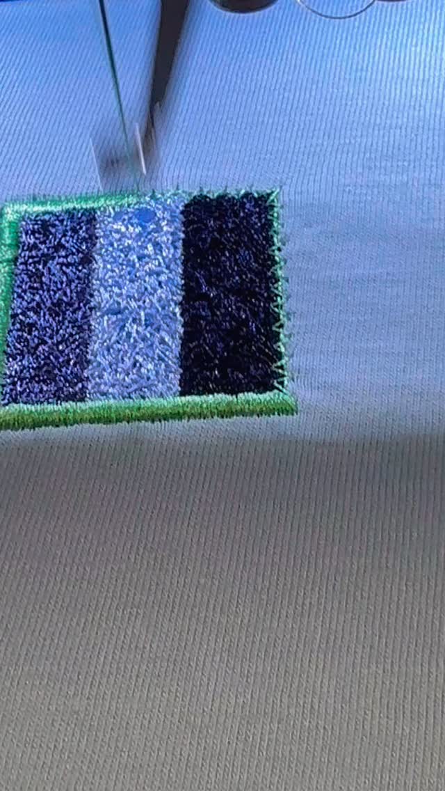 Watch the magic happen. ✨ From a digital file to a perfectly stitched patch. There’s nothing quite like the rhythm and detail of a machine bringing a design to life! #EmbroideryArt #MachineEmbroidery #SatisfyingVideos #NewJerseySmallBusiness #Craftsmanship