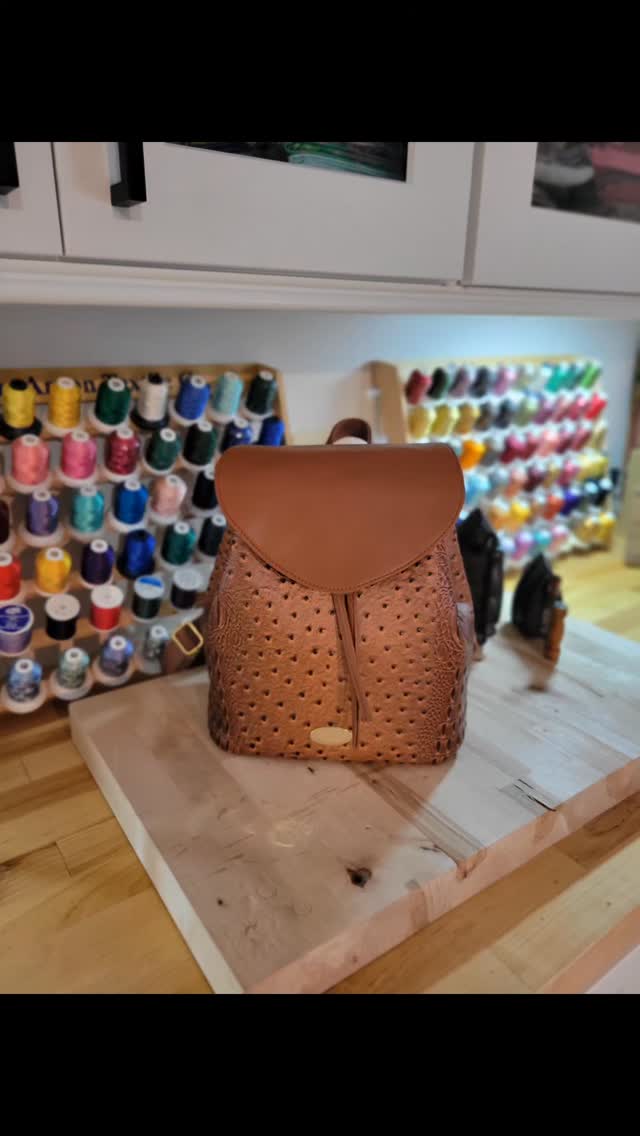 The Mayfield backpack, pattern by Knotted Threads. This bag is made from alligator print, chocolate brown faux leather. The interior has one zipper pocket for your valuables, and the interior is open and spacious, for whatever you want to take with you. Comfy adjustable shoulder straps make it easy to carry over your shoulder or wear as a backpack. It is a medium-sized backpack that is not cumbersome. The dimensions are 10" wide, 10" tall, and 6.5" deep. This one will be available on my website.
#knottedthreads #mayfield #fashionbackpack #everdaybag #custombag #fauxleather #fauxleatherbags #carryeverything #stylishbag #lightweightbag