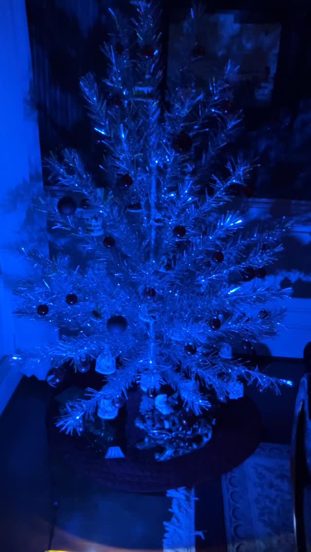 Among the decorations here at the North Pole is a vintage 1960s era aluminum tree complete with color wheel light.