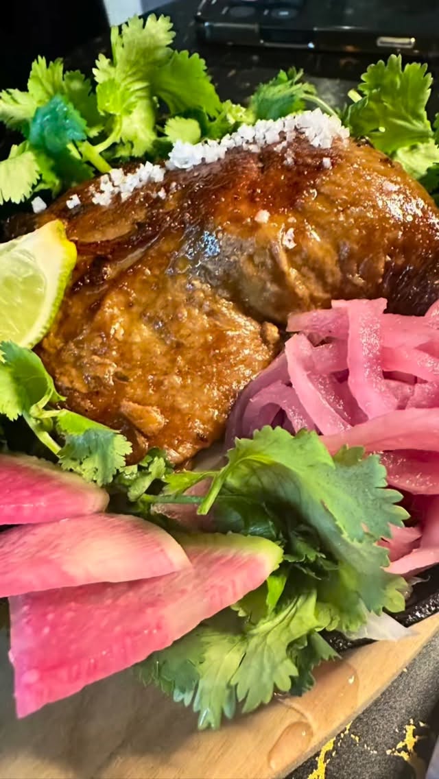 Chef Israel Alvarez Molina has created a brilliant new dish at MAiiZ Nixtamal - rich, tender duck carnitas with a complex new mole sauce that includes some Asian notes, like plums and Szechuan peppers, a nod to this cosy Mexican restaurant’s Chinatown location. Delivered in a sizzling cast iron pan with his warm handmade traditional tortillas, it’s an elevated, interactive experience for diners. I love the new moody lighting in this small space and now you can enjoy a cocktail (or their own MAIiZ Mexican lager made locally by Il Sauvage Brewing), and later evening hours. There’s even a funky yellow robot ‘on staff’ to help run food from the open kitchen! Take away a jar of Israel’s mole to enjoy at home, too. #eatlocal #dininginvictoria #nixtamalization #elevatedmexicanfood #topchef #holymole #duckconft @maiiz.nixtamal