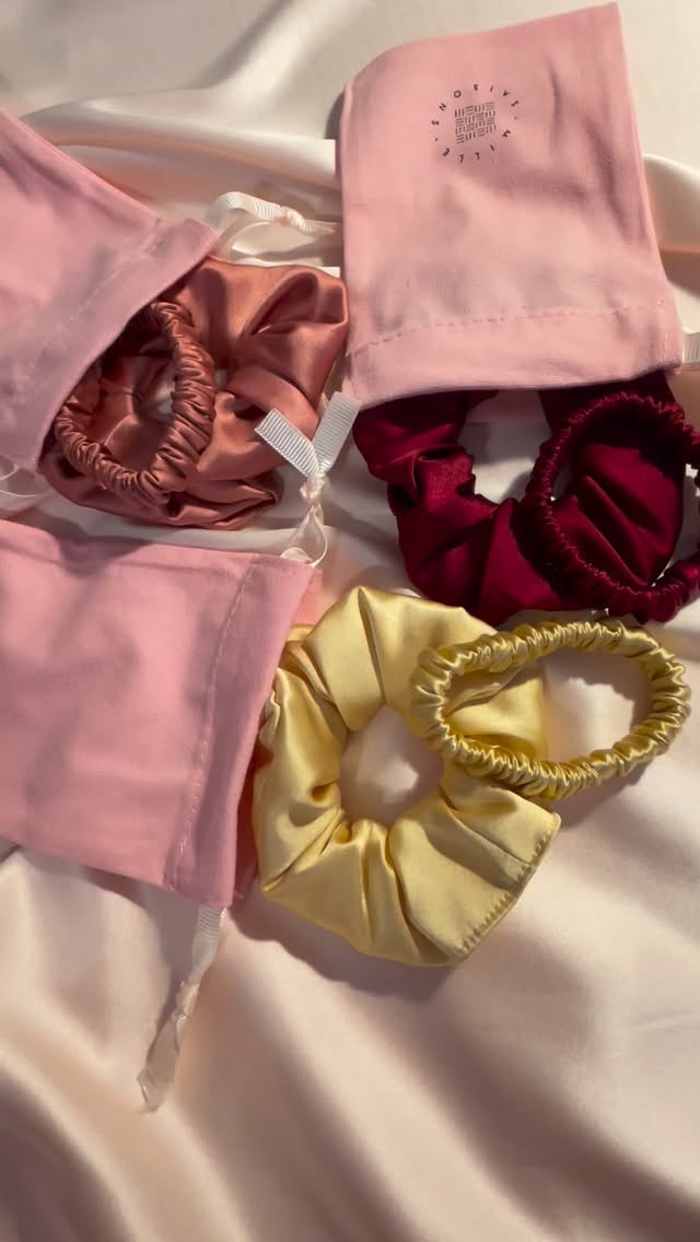 One of my favourite gift sets are these scrunchie and hair elastic duos, and even better at the moment, they have an extra 10% off for Black Friday (ends Monday 1st December) making them just £14.40!
I am working and sewing hard to try and keep these in stock until Monday when the Black Friday sale ends
Video description- three gift sets of a matching silk scrunchie and hair elastic in mid pink, deep red and gold. Jo’s hands then pack each set into separate Mille Saisons branded pink drawstring gift bags