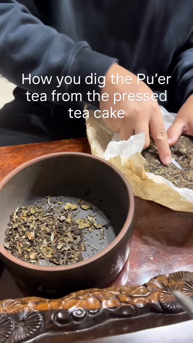 This is how you dig your Puer tea from the pressed tea cake.
Pu’er is a variety of fermented tea traditionally produced in Yunnan Province, China. Pu-erh tea is made from the leaves of the Yunnan tea plant Camellia sinensis var. assamica, which is a specific variety of tea plant that is native to Yunnan Province.
#yunnantravel #kikiholidays #china #yunnan #chinatrip